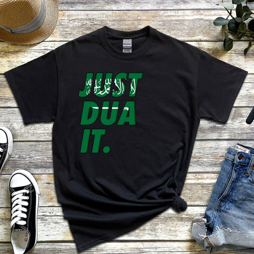 a t - shirt that says just dua it next to a pair of jeans