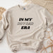 a sweater with the words in my boy dad era printed on it