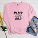 a pink sweatshirt with the words in my abu era printed on it