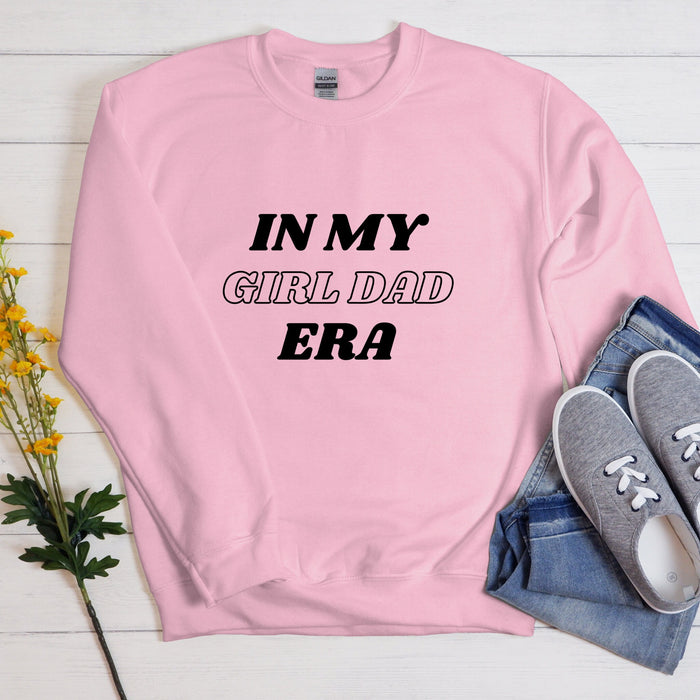 a pink sweatshirt that says in my girl dad era