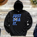 a black hoodie that says just dua it