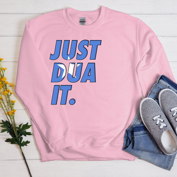 a pink sweatshirt with the words just dua it on it